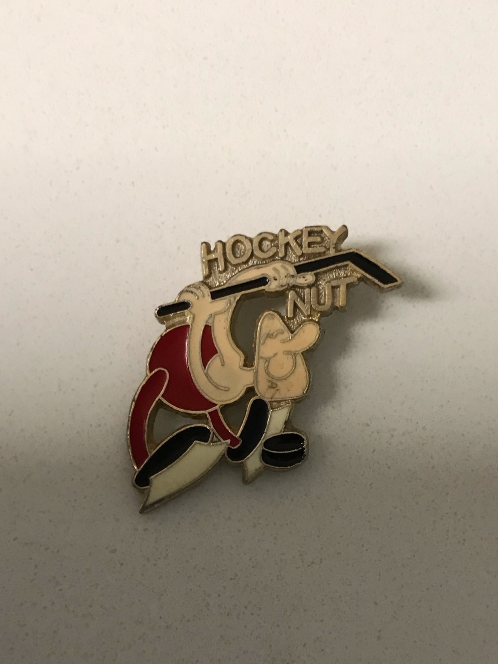 Vintage 'Hockey Nut' Enamel Pin - Red, Black, Cream